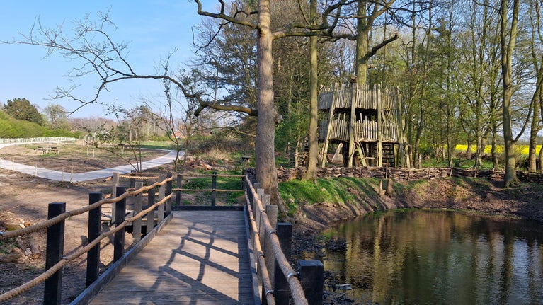 A view from the new boardwalk over the pond at the end of Stablecroft where it meets the Woodland - in the foreground is the tree hide and the new paths.